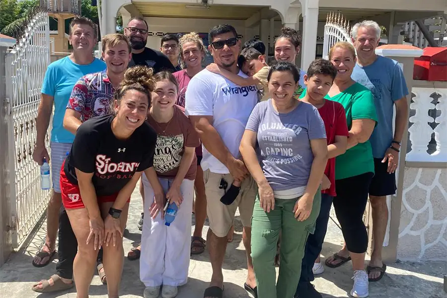 Christian volunteers serving in mission field - faith-based service opportunities